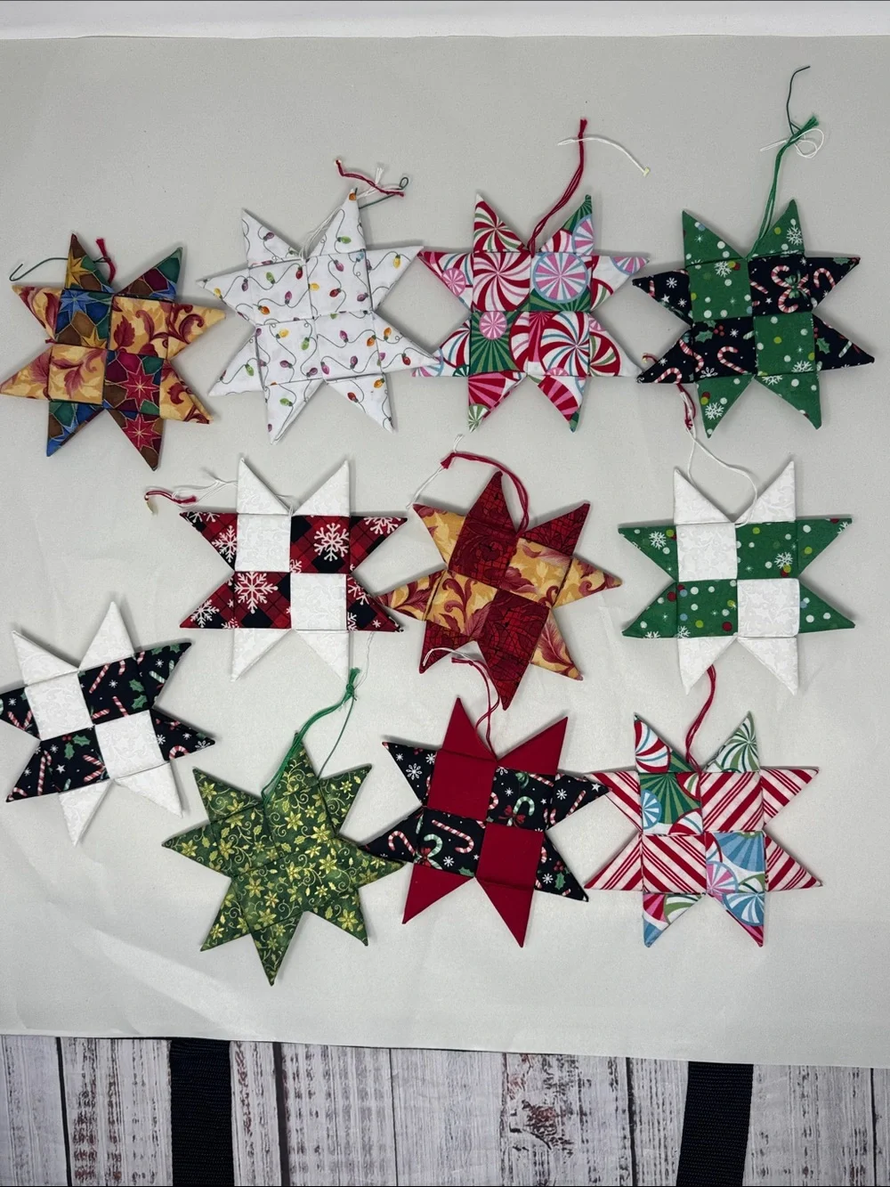 HANDMADE FOLDED FABRIC FOLDED STARS CHRISTMAS ORNAMENTS QUILT LOT OF 11 BOHO